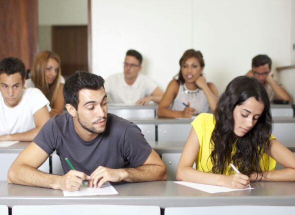 the photo shows a test-taker cheating on the IELTS test
