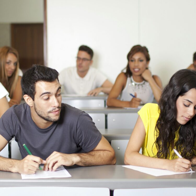 the photo shows a test-taker cheating on the IELTS test