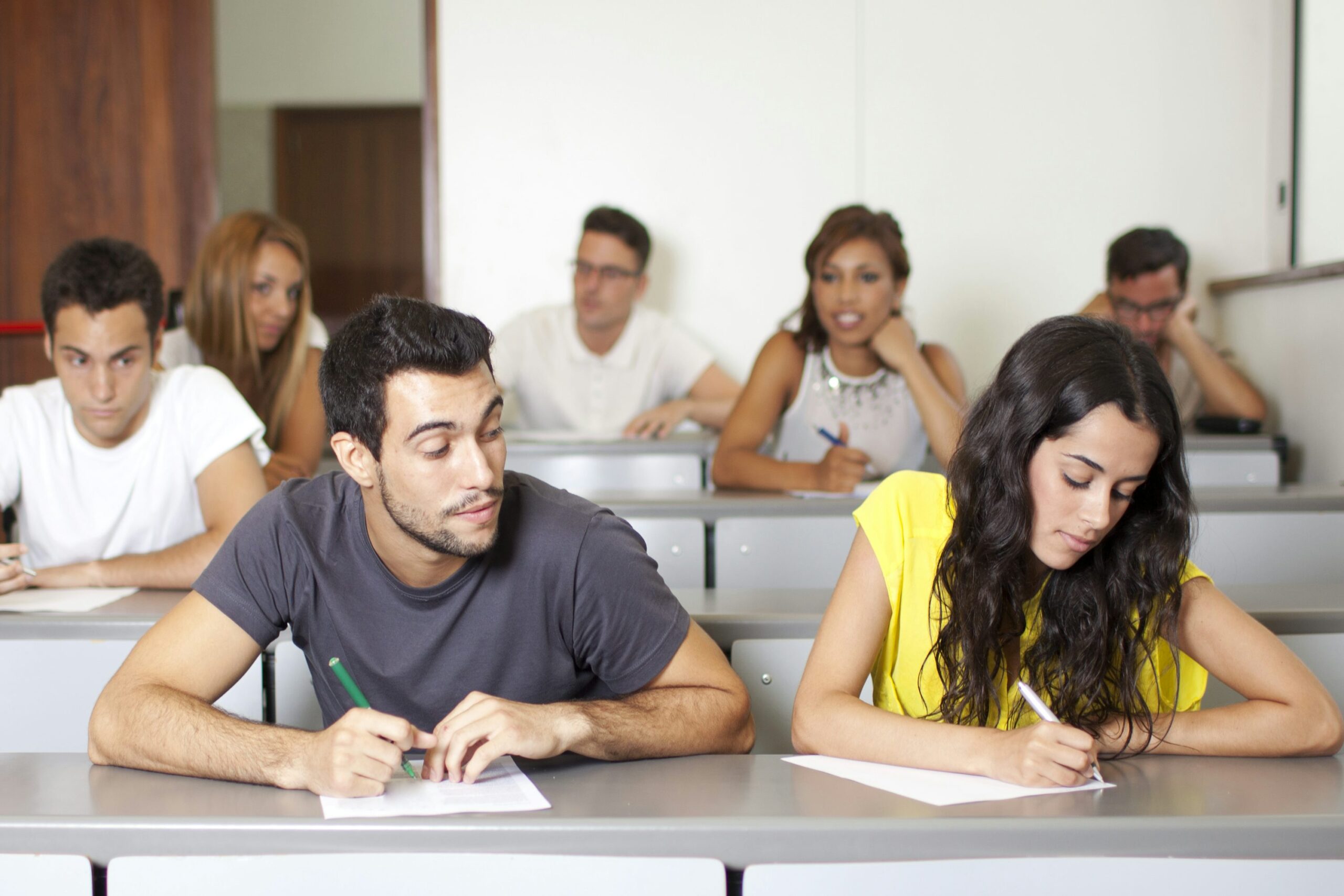 the photo shows a test-taker cheating on the IELTS test