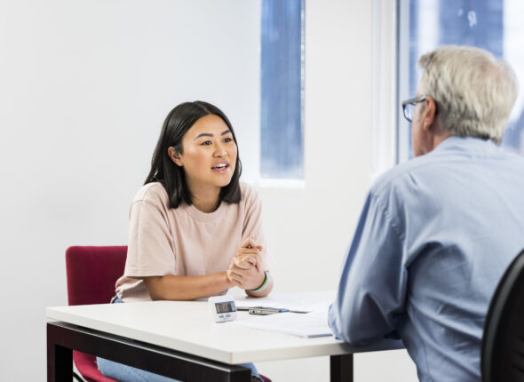 A woman taking the IELTS speaking test