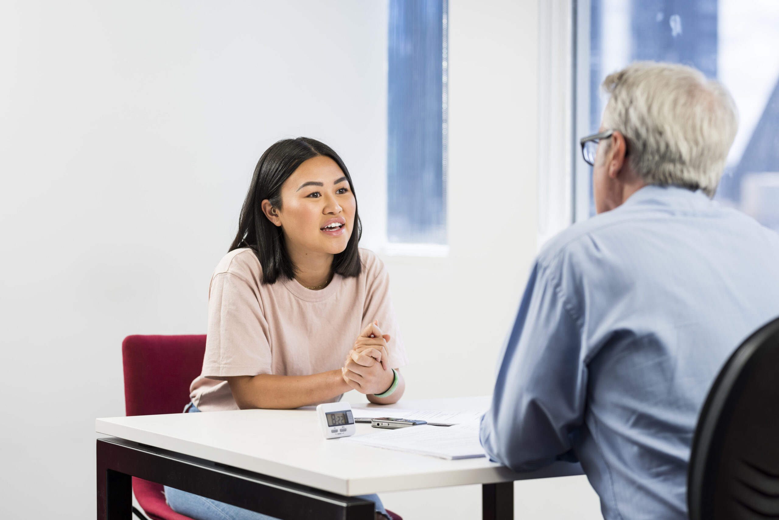 A woman taking the IELTS speaking test